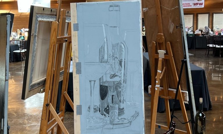 black and white painting of wine glasses set on an easel
